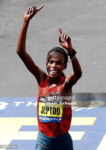 Rita Jeptoo of Kenya crosses the finish line to win the 118th Boston Marathon on April 21, 2014 in Boston, Massachusetts.