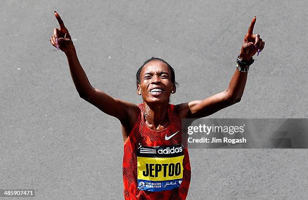 Rita Jeptoo of Kenya celebrates after winning the 118th Boston Marathon on April 21, 2014 in Boston, Massachusetts.