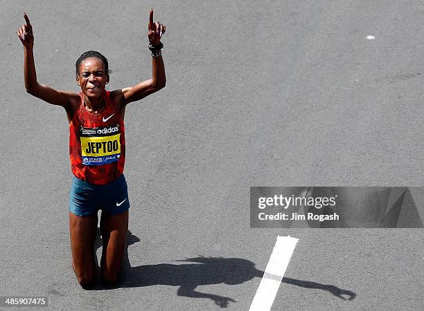 Rita Jeptoo of Kenya celebrates after winning the 118th Boston Marathon on April 21, 2014 in Boston, Massachusetts.