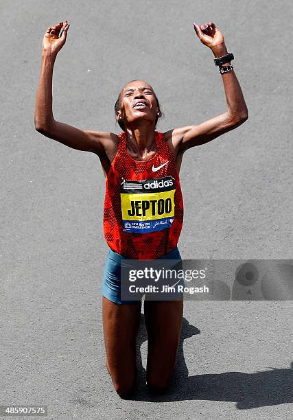 Rita Jeptoo of Kenya celebrates after winning the 118th Boston Marathon on April 21, 2014 in Boston, Massachusetts.