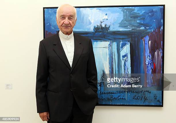 German Actor Armin Mueller-Stahl attends the opening of his 'Menschheitszirkus' exhibition in front of his painting 'An Einem Herbst Morgen In...