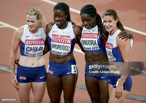 Christine Ohuruogu of Great Britain, Anyika Onuora of Great Britain, Eilidh Child of Great Britain and Seren Bundy-Davies of Great Britain celebrate...