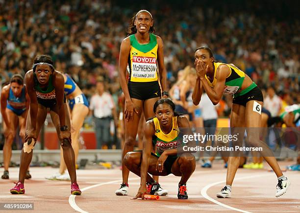 Gold medalists Shericka Jackson of Jamaica, Stephenie Ann McPherson of Jamaica, Novlene Williams-Mills of Jamaica and Christine Day of Jamaica look...