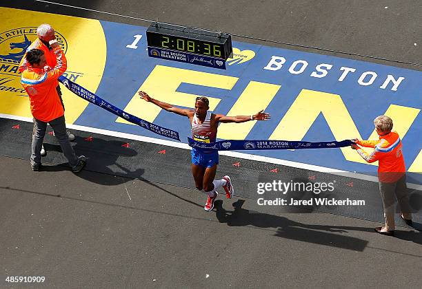 Meb Keflezighi of the United States crosses the finish line in first place to win the 2014 B.A.A. Boston Marathon on April 21, 2014 in Boston,...