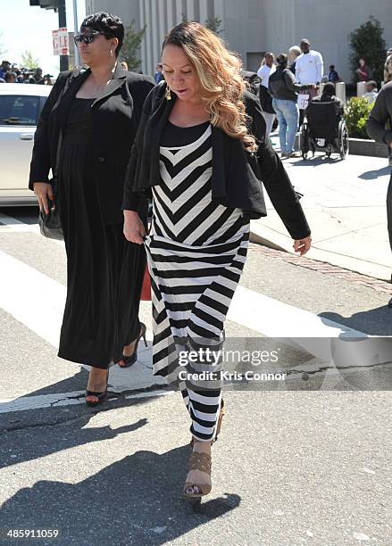 Joyce Hawkins leaves the H. Carl Moultrie 1 Courthouse after it was announced the start of Chris Brown's assault trial is to be pushed back to...