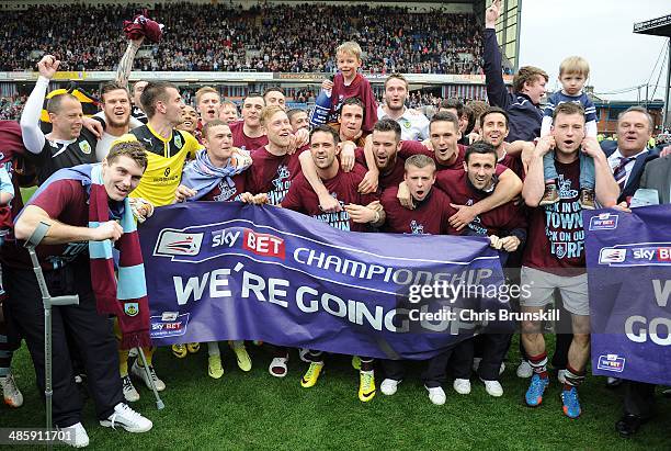 Burnley celebrate following the Sky Bet Championship match between Burnley and Wigan Athletic at Turf Moor on April 21, 2014 in Burnley, England.