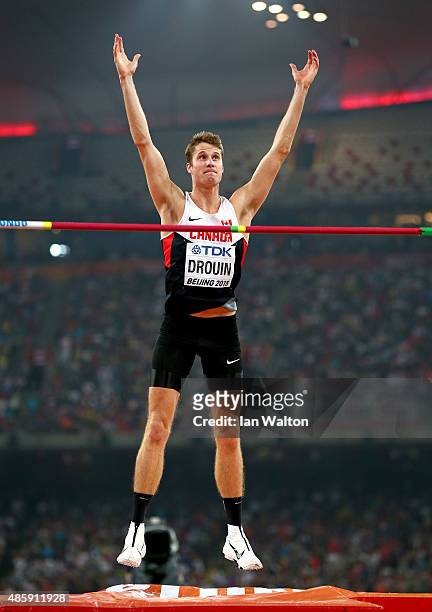 Gold medalist Derek Drouin of Canada celebrates a jump in the Men's High Jump Final during day nine of the 15th IAAF World Athletics Championships...