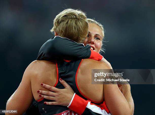 Christin Hussong of Germany hugs Christina Obergfoll of Germany after the Women's Javelin final during day nine of the 15th IAAF World Athletics...