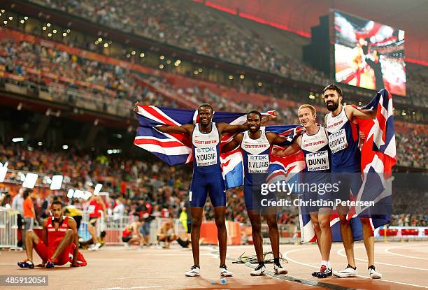 Rabah Yousif of Great Britain, Delanno Williams of Great Britain, Jarryd Dunn of Great Britain and Martyn Rooney of Great Britain celebrate after...