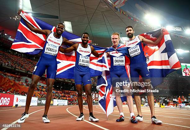 Rabah Yousif of Great Britain, Delanno Williams of Great Britain, Jarryd Dunn of Great Britain and Martyn Rooney of Great Britain celebrate after...