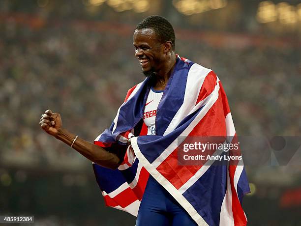 Rabah Yousif of Great Britain celebrates after winning bronze in the Men's 4x400 Metres Relay final during day nine of the 15th IAAF World Athletics...