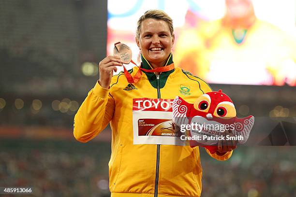 Bronze medalist Sunette Viljoen of South Africa poses on the podium during the medal ceremony for the Women's Javelin final during day nine of the...