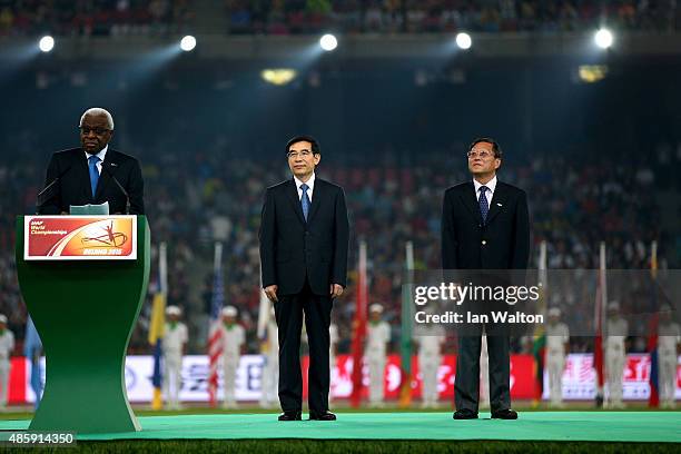 President Lamine Diack speaks as Wang Anshun, Lord Mayor of Beijing looks on during the closing ceremony during day nine of the 15th IAAF World...