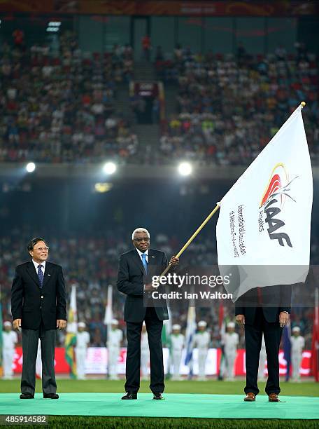 President Lamine Diack hands over the IAAF flag during the closing ceremony during day nine of the 15th IAAF World Athletics Championships Beijing...