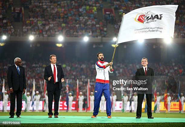 Martyn Rooney Captain of Great Britain waves the IAAF flag during the closing ceremony during day nine of the 15th IAAF World Athletics Championships...