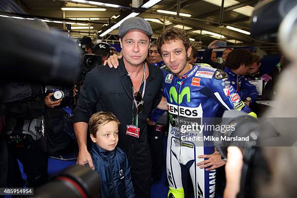 Brad Pitt and Valentino Rossi attend the MotoGP British Grand Prix race at Silverstone ahead of the release of documentary Hitting The Apex. Pitt is...