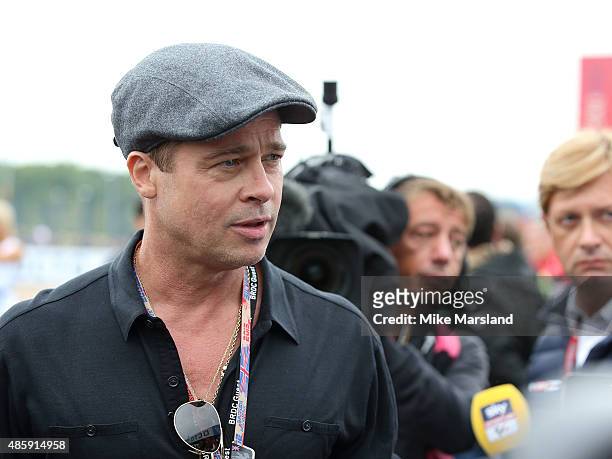Brad Pitt attends the MotoGP British Grand Prix race at Silverstone ahead of the release of documentary Hitting The Apex. Pitt is presenting the...