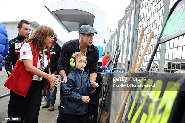 Brad Pitt and his son Knox Jolie-Pitt attend the MotoGP British Grand Prix race at Silverstone ahead of the release of documentary Hitting The Apex....