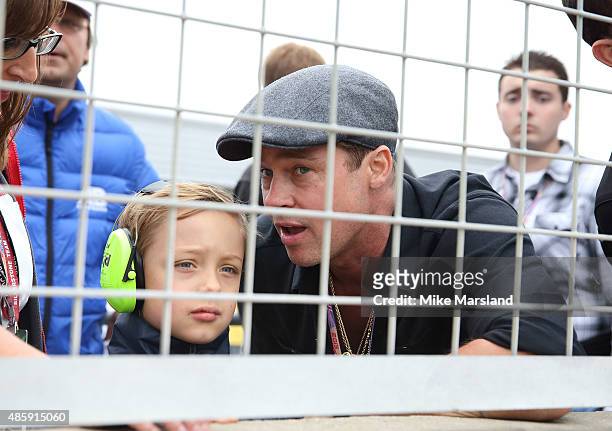 Brad Pitt and his son Knox Jolie-Pitt attend the MotoGP British Grand Prix race at Silverstone ahead of the release of documentary Hitting The Apex....