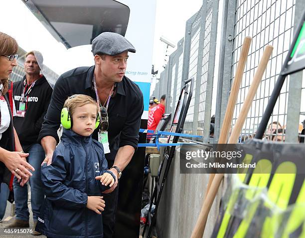 Brad Pitt and his son Knox Jolie-Pitt attend the MotoGP British Grand Prix race at Silverstone ahead of the release of documentary Hitting The Apex....