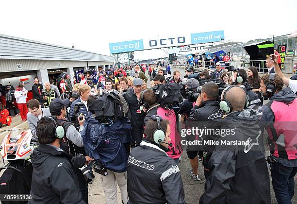 Brad Pitt attends the MotoGP British Grand Prix race at Silverstone ahead of the release of documentary Hitting The Apex. Pitt is presenting the...