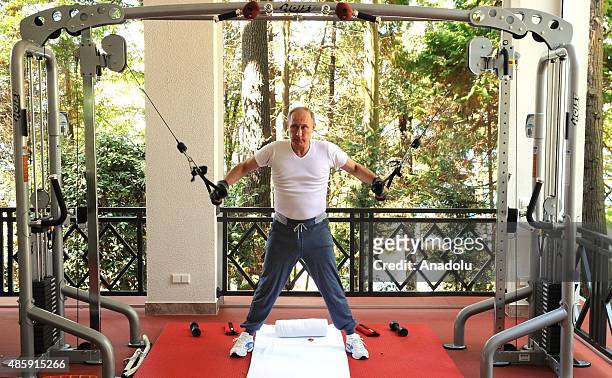 Russia's President Vladimir Putin works out at Bocharov Ruchei residence in Sochi, Russia on August 30,2015.