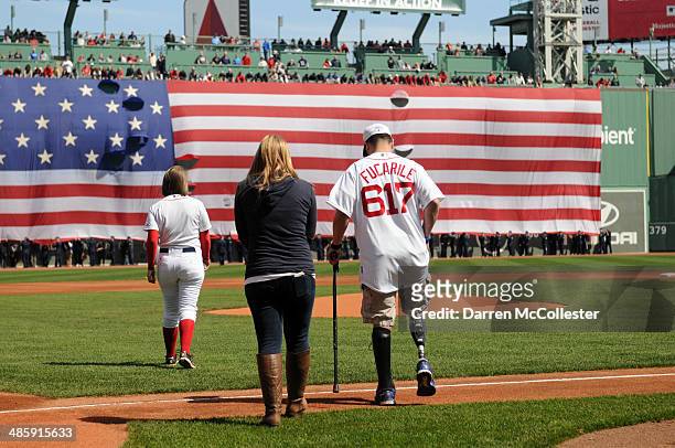Marc Fucarile, injured in last years Boston Marathon bombings, prepares to throw out the first pitch prior to the Boston Red Sox/ Baltimore Orioles...