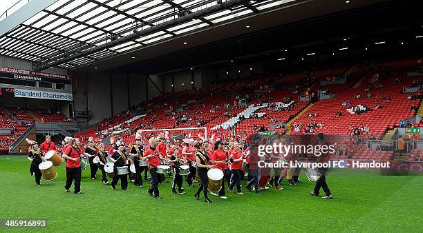 In this handout image provided by Liverpool FC, Samba band of Liverpool perform before the celebration of the 96 Charity Match at Anfield on April...