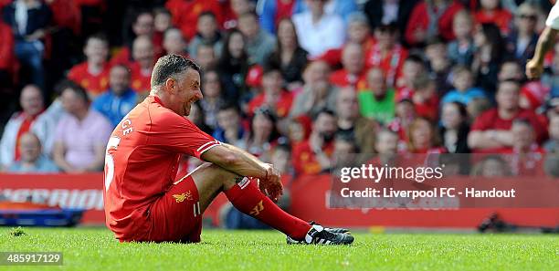 In this handout image provided by Liverpool FC, John Aldridge of Liverpool laughs during the celebration of the 96 Charity Match at Anfield on April...