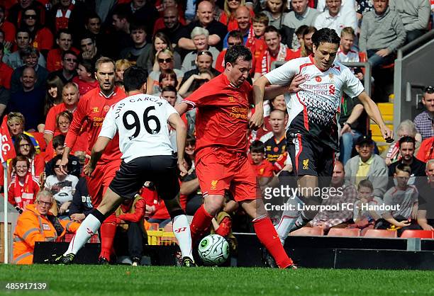 In this handout image provided by Liverpool FC, Robbie Fowler of Liverpool during the celebration of the 96 Charity Match at Anfield on April 21,...