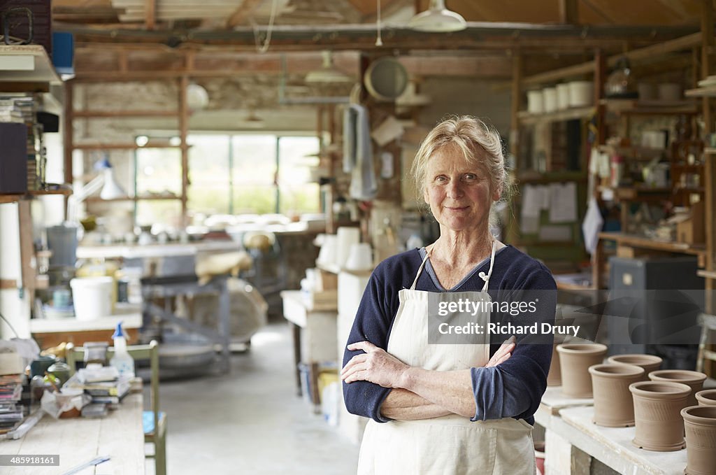 Potter in workshop
