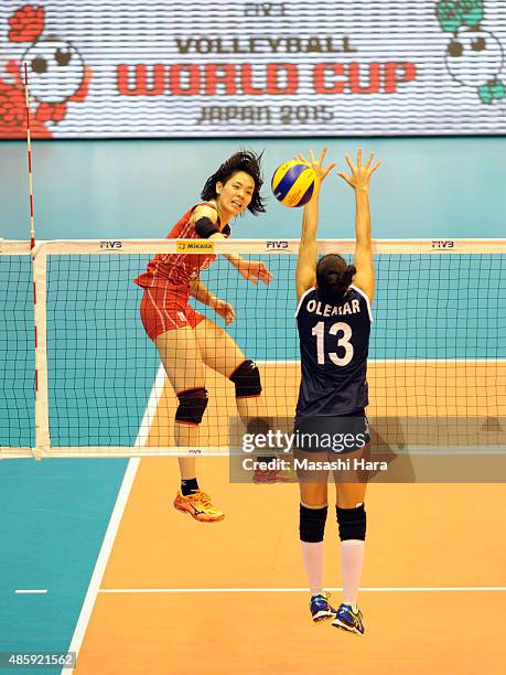 Saori Sakoda of Japan spikes during in the match between Japan and Peru during the FIVB Women's Volleyball World Cup Japan 2015 at Sendai City...