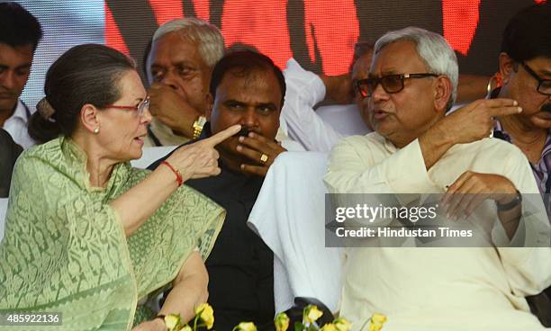 Congress President Sonia Gandhi with Bihar Chief Minister Nitish Kumar during the Swabhiman rally at Gandhi Maidan, on August 30, 2015 in Patna,...