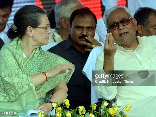 Congress President Sonia Gandhi with Bihar Chief Minister Nitish Kumar during the Swabhiman rally at Gandhi Maidan, on August 30, 2015 in Patna,...
