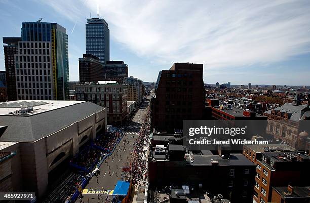 Runners make their way down Boylston Street near the finish line during the 2014 B.A.A. Boston Marathon on April 21, 2014 in Boston, Massachusetts....