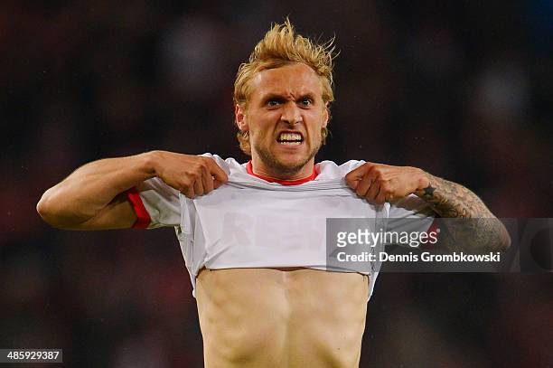 Marcel Risse of 1. FC Koeln celebrates his team's first goal during the Second Bundesliga match between 1. FC Koeln and VfL Bochum at...