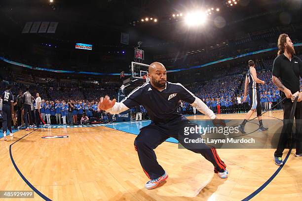 Derek Fisher of the Oklahoma City Thunder warms up before the game against the Memphis Grizzlies in Game One of the Western Conference Quarterfinals...