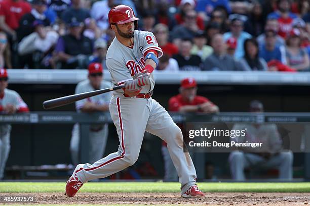 Wil Nieves of the Philadelphia Phillies takes an at abt against the Colorado Rockies at Coors Field on April 20, 2014 in Denver, Colorado. The...