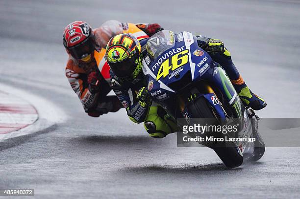 Valentino Rossi of Italy and Movistar Yamaha MotoGP leads Marc Marquez of Spain and Repsol Honda Team during the MotoGP race during the MotoGp Of...