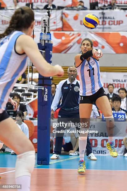 Julieta Constanza Lazcano of Argentina tosses the ball in the match against Algeria during the FIVB Women's Volleyball World Cup Japan 2015 at...