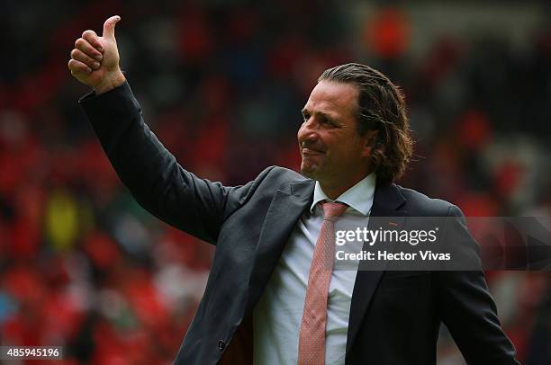 Juan Antonio Pizzi, head coach of Leon celebrates after winning a 7th round match between Toluca and Leon as part of the Apertura 2015 Liga MX at...