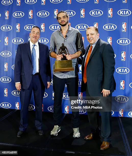 Joakim Noah of the Chicago Bulls, center, poses for a photo with Chicago Bulls Head Coach Tom Thibodeau, right, and Chicago Bulls General Manager Gar...