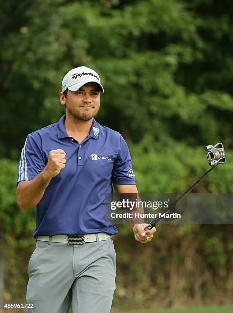 Jason Day of Australia celebrates a long birdie putt on the 14th hole during the final round of The Barclays at Plainfield Country Club on August 30,...