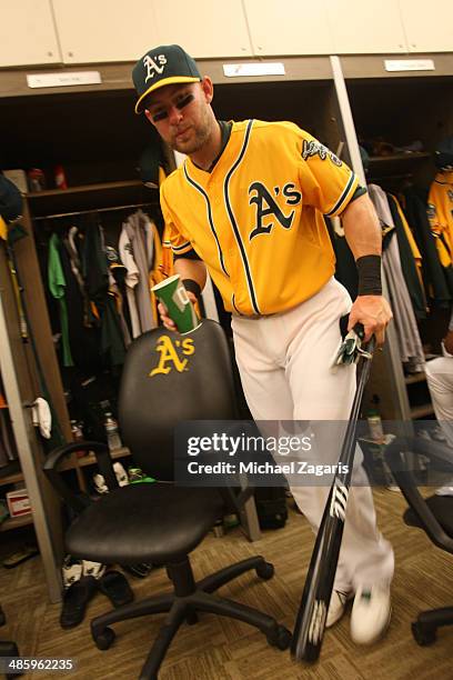 Daric Barton of the Oakland Athletics stands in the clubhouse prior to the game against the Seattle Mariners at O.co Coliseum on April 5, 2014 in...