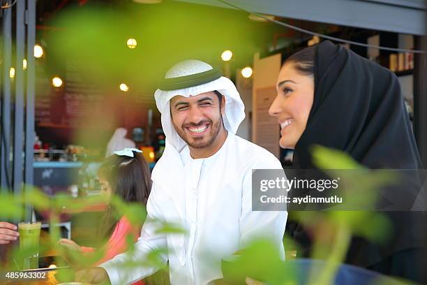 arabian young family - young muslim man stockfoto's en -beelden