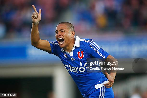 Leandro Benegas of Universidad de Chile celebrates after scoring the fourth goal of his team during a match between U de Chile and Palestino as part...