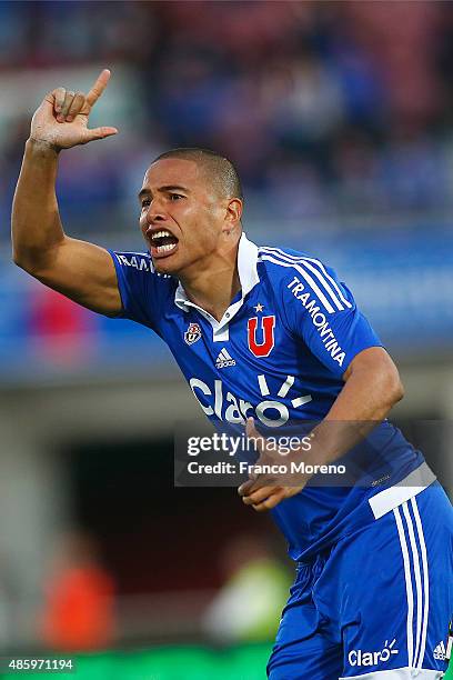 Leandro Benegas of Universidad de Chile celebrates after scoring the fourth goal of his team during a match between U de Chile and Palestino as part...