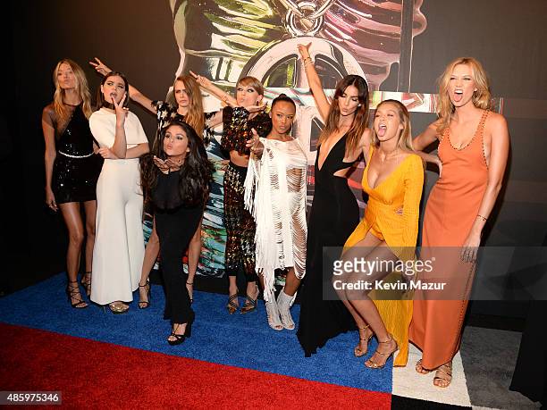 Models Gigi Hadid and Martha Hunt, actress Hailee Steinfeld, model Cara Delevingne, recording artists Selena Gomez and Taylor Swift, actress Serayah...