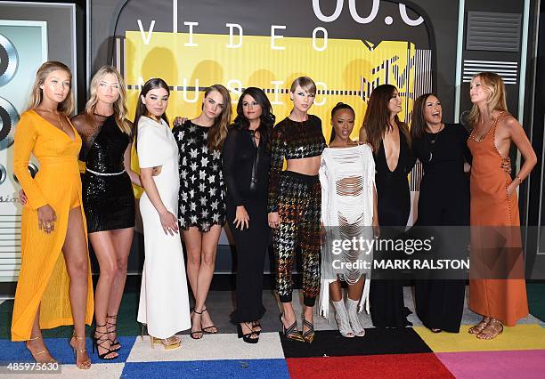 Models Gigi Hadid, Martha Hunt, actress Hailee Steinfeld, model Cara Delevingne, actress Selena Gomez, musician Taylor Swift, model Serayah, actress...