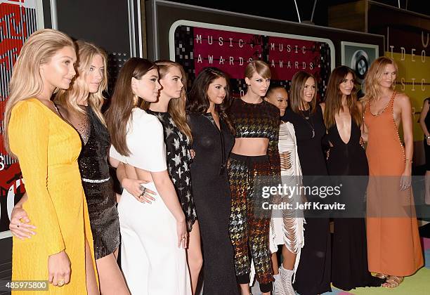 Models Gigi Hadid and Martha Hunt, actress Hailee Steinfeld, model Cara Delevingne, recording artists Selena Gomez and Taylor Swift, actress Serayah...